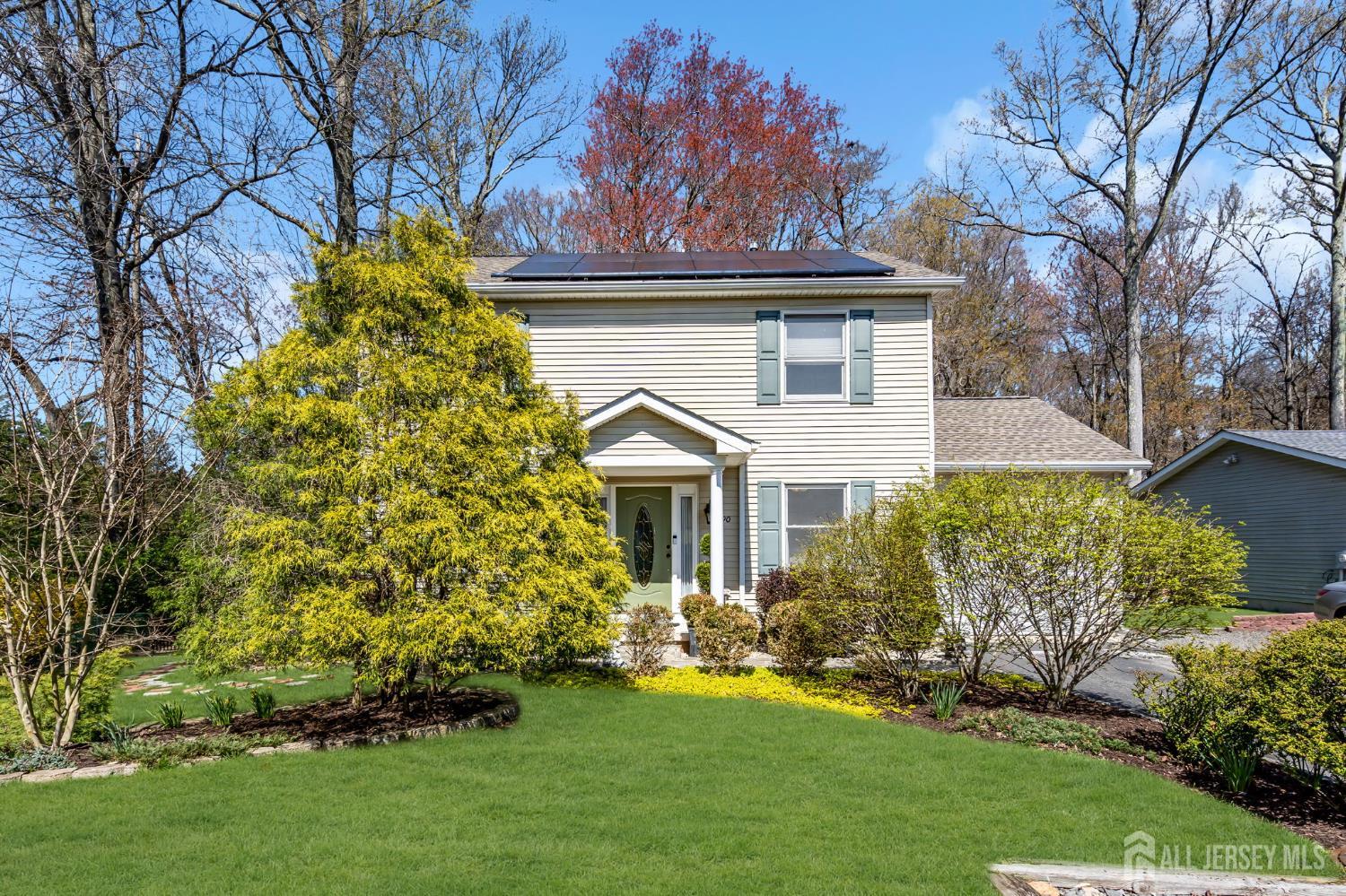 90 Bear Brook Road Princeton, NJ 08540 - Photo 2 of 60 a front view of a house with a garden