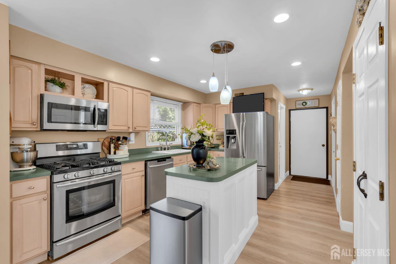 90 Bear Brook Road Princeton, NJ 08540 - Photo 25 of 60 a kitchen with stainless steel appliances granite countertop a sink stove and refrigerator