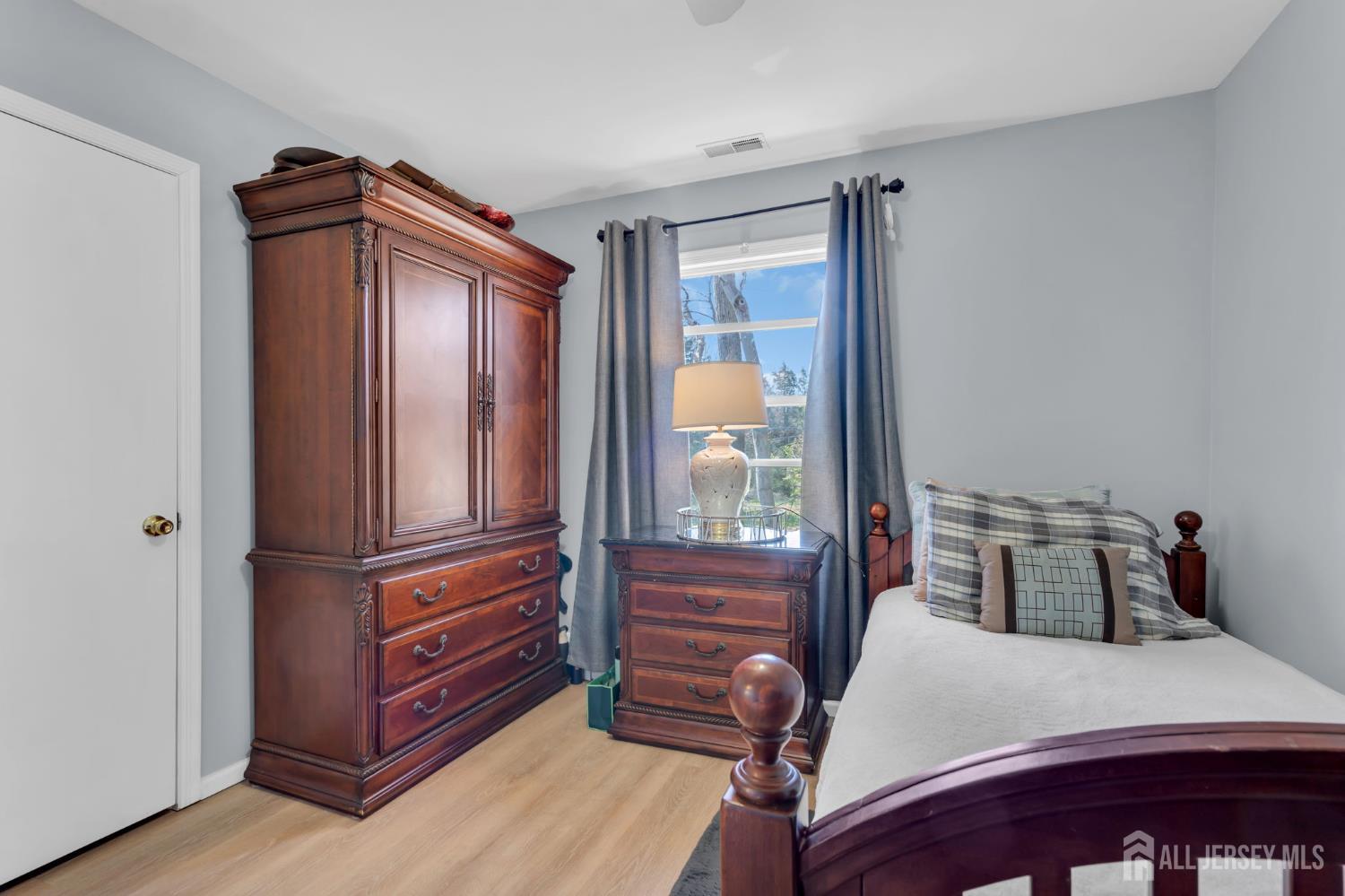 90 Bear Brook Road Princeton, NJ 08540 - Photo 40 of 60 a bedroom with a bed and a mirror