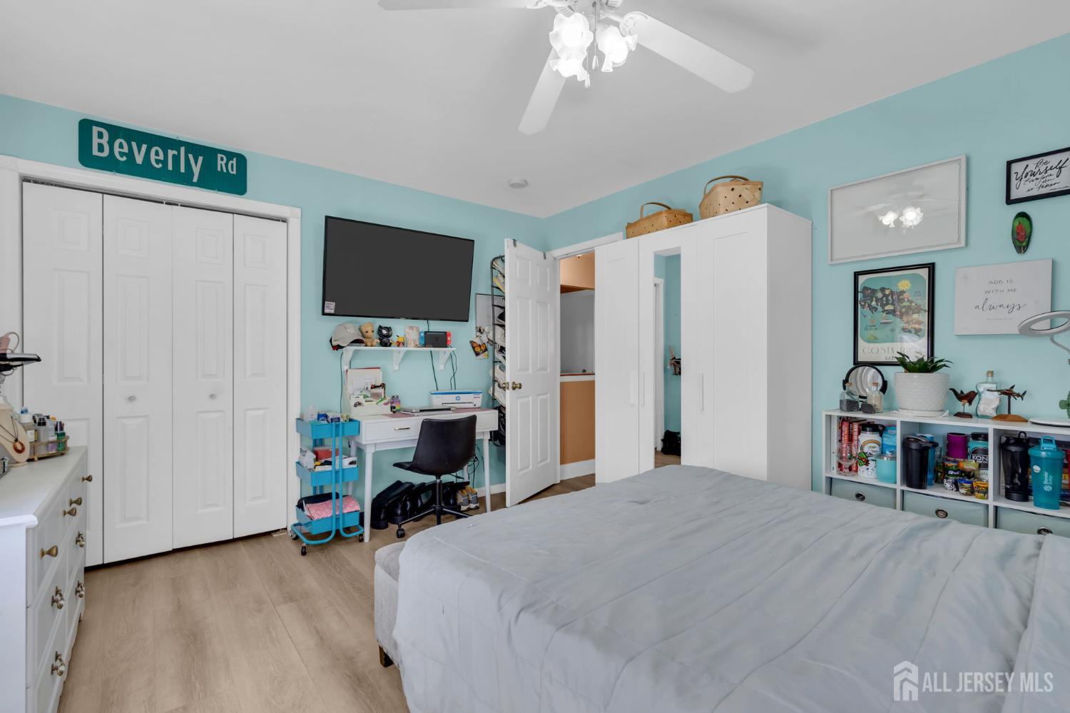 90 Bear Brook Road Princeton, NJ 08540 - Photo 44 of 60 a bed room with a bed and a flat screen tv