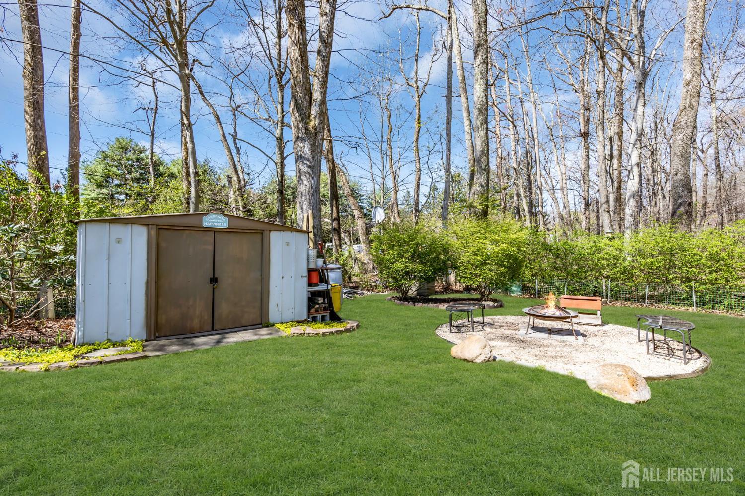 90 Bear Brook Road Princeton, NJ 08540 - Photo 47 of 60 a view of a backyard with sitting area