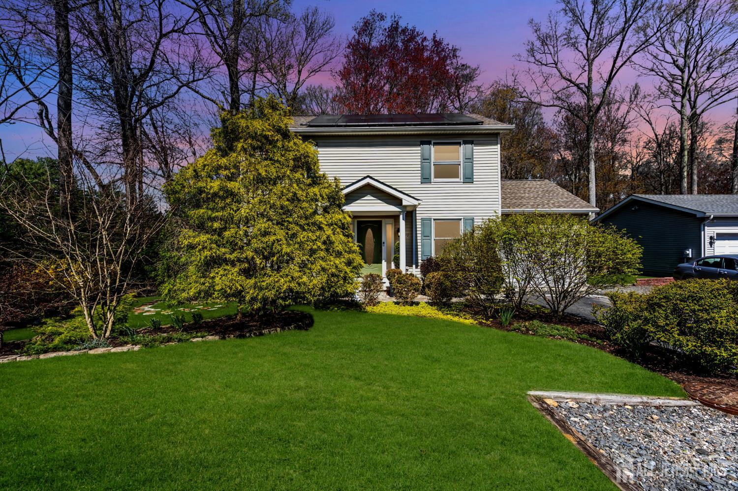90 Bear Brook Road Princeton, NJ 08540 - Photo 5 of 60 a front view of a house with a garden