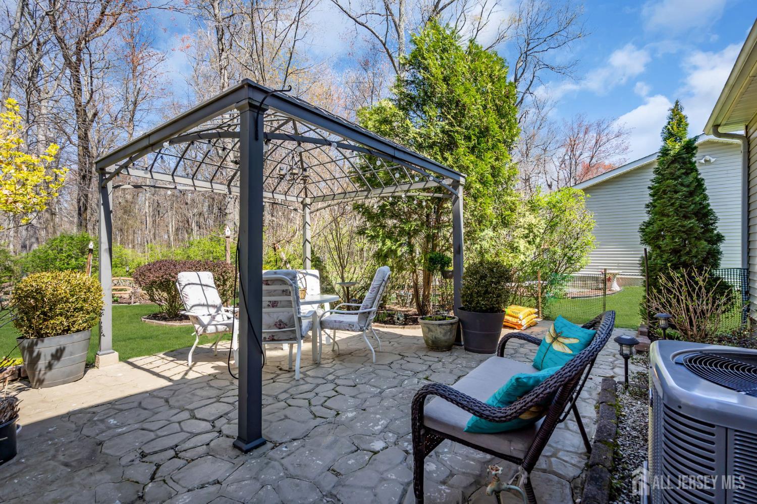 90 Bear Brook Road Princeton, NJ 08540 - Photo 55 of 60 a view of a chairs and table in the patio