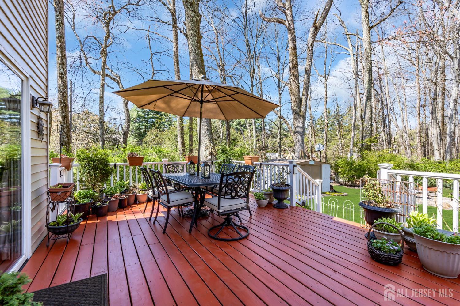 90 Bear Brook Road Princeton, NJ 08540 - Photo 58 of 60 a view of backyard with outdoor seating and wooden floor