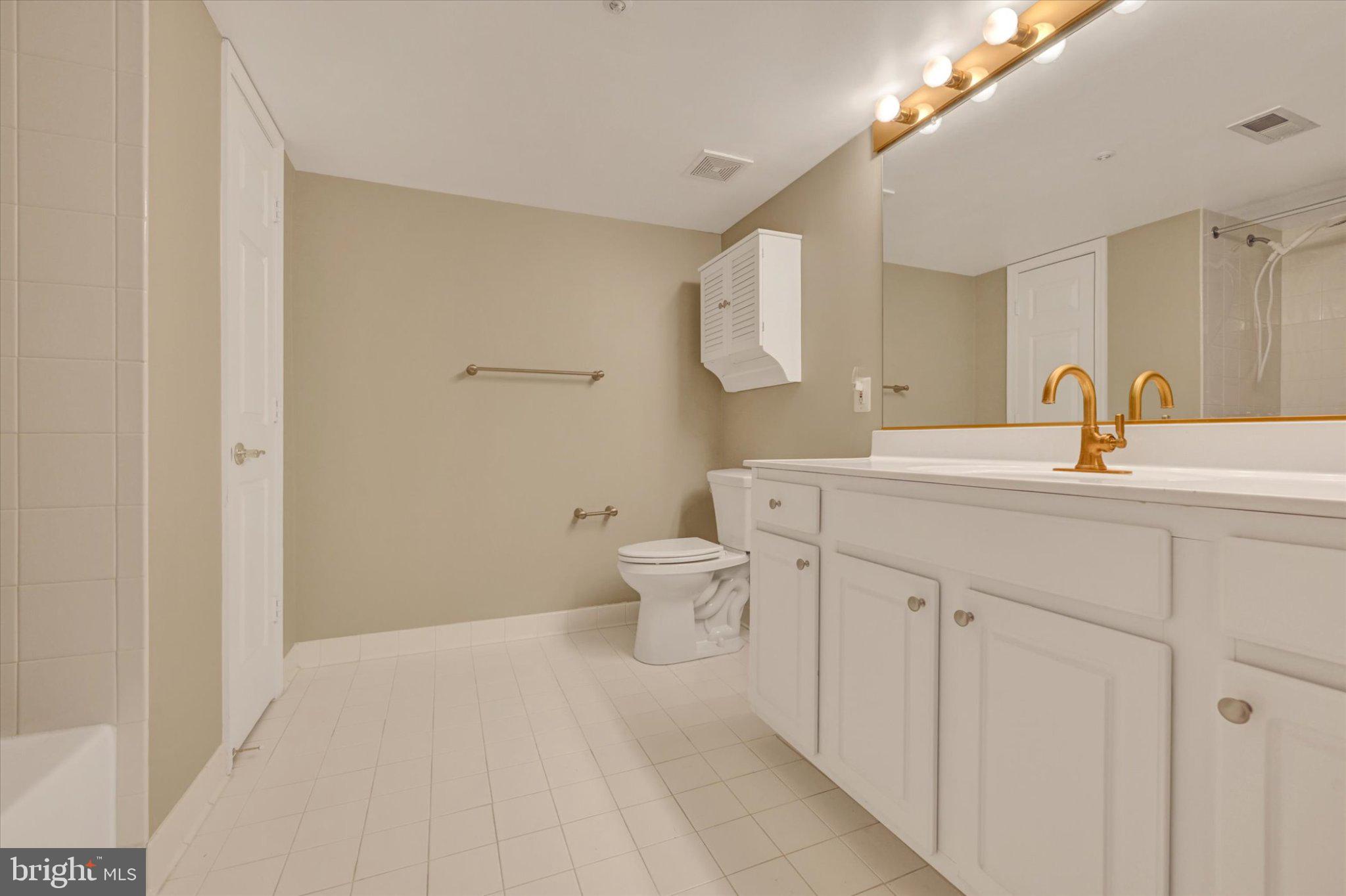 12310 Rosslare Ridge Road, Unit 405 Lutherville-Timonium, MD 21093 - Photo 19 of 36 Spacious, modern bathroom retreat.
