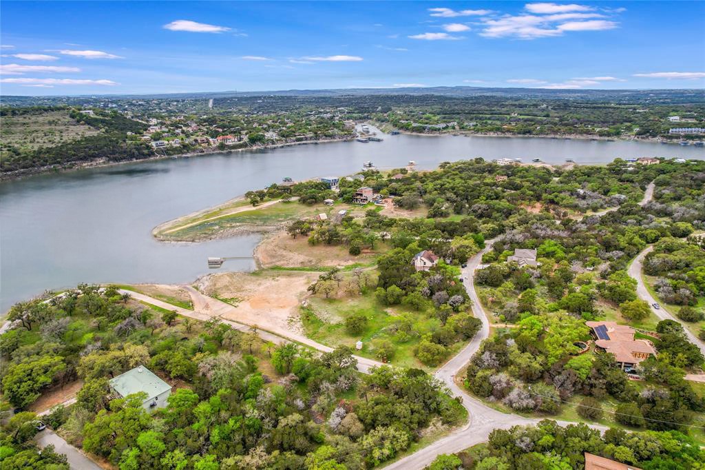 1403 Emerald Road Leander, TX 78645 - Photo 6 of 25 a view of a lake with a mountain