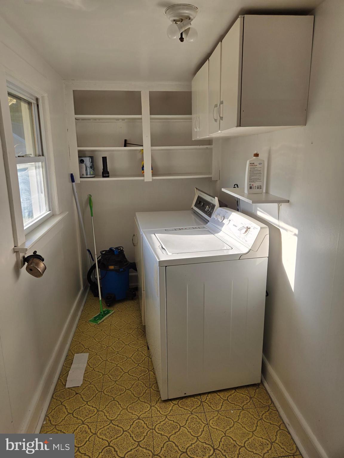 5258 Preston Road Federalsburg, MD 21632 - Photo 3 of 19 a utility room with a sink washer and dryer