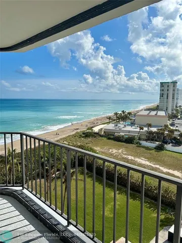 a view of a balcony with lake view