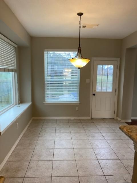 18810 Rusty Anchor Court Humble, TX 77346 - Photo 16 of 26 a view of an empty room with window and chandelier fan