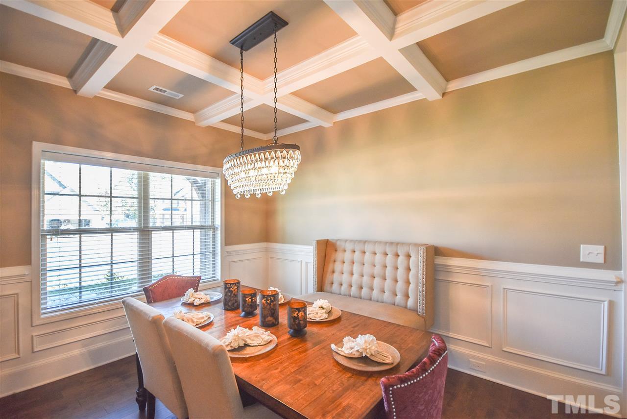 146 Shellbark Drive Spring Lake, NC 28390 - Photo 2 of 25 a view of a dining room with furniture window and wooden floor
