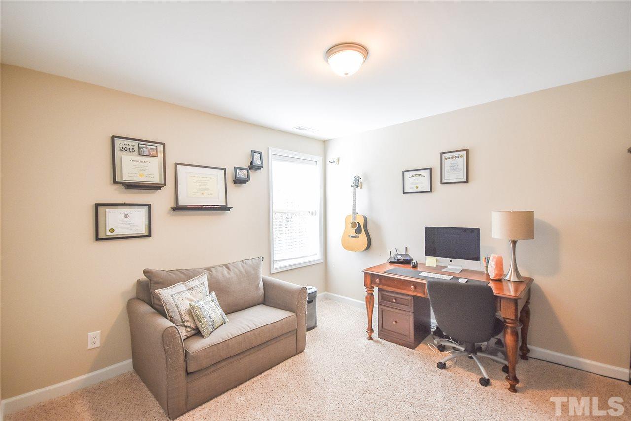 146 Shellbark Drive Spring Lake, NC 28390 - Photo 13 of 25 a workspace with furniture and a workspace