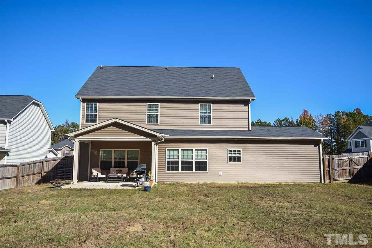 146 Shellbark Drive Spring Lake, NC 28390 - Photo 23 of 25 a front view of a house with a yard