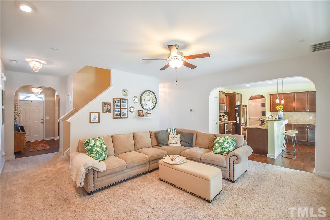 146 Shellbark Drive Spring Lake, NC 28390 - Photo 4 of 25 a living room with furniture and kitchen view