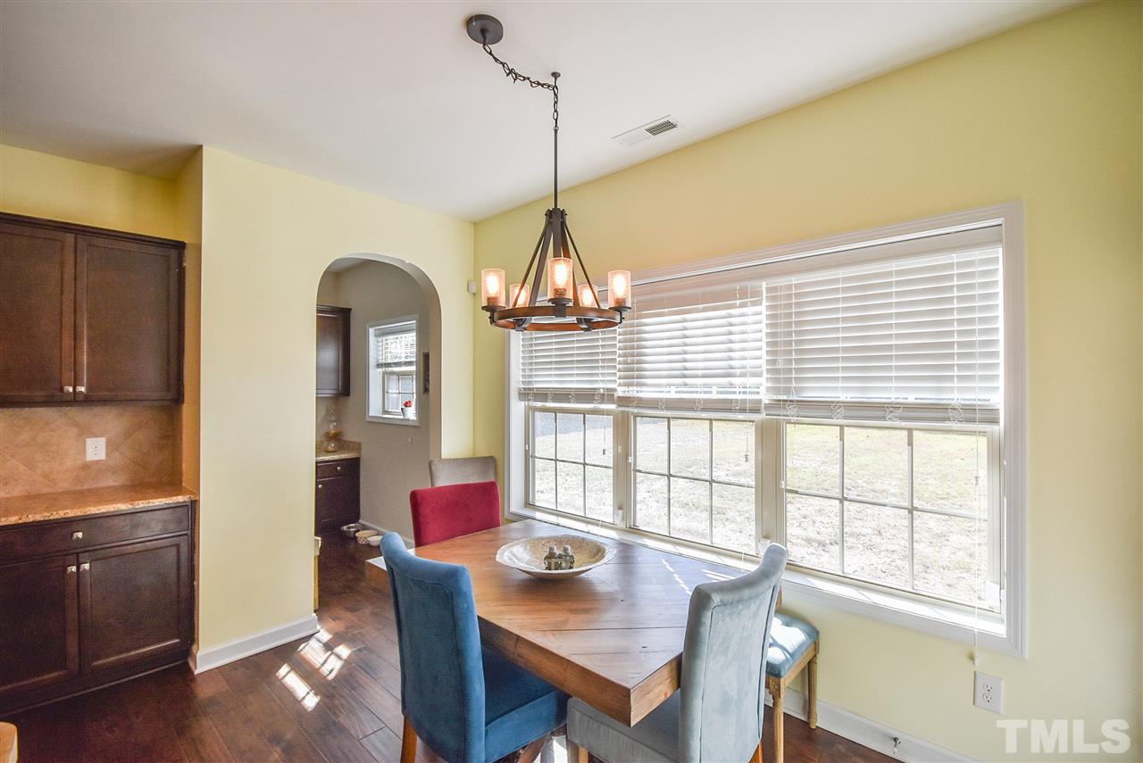 146 Shellbark Drive Spring Lake, NC 28390 - Photo 5 of 25 a dining room with furniture window wooden floor
