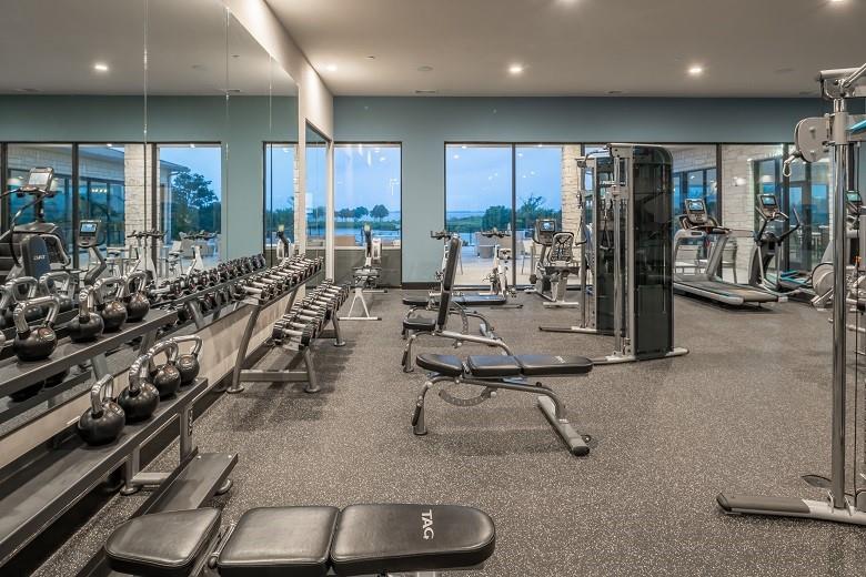 2715 Triumph Court Heath, TX 75126 - Photo 21 of 30 a view of a room with gym equipment
