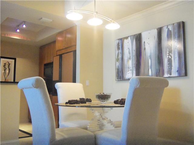 99 Southeast Mizner Boulevard, Unit 533 Boca Raton, FL 33432 - Photo 5 of 14 a room with furniture and window