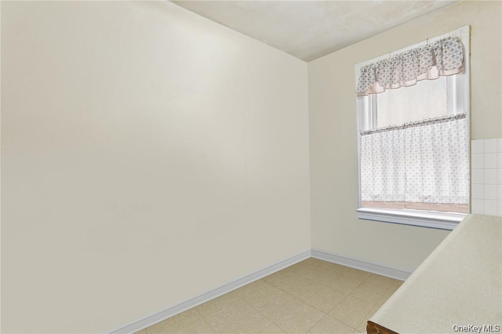 97-28 41st Avenue Queens, NY 11368 - Photo 19 of 29 an empty room with a window
