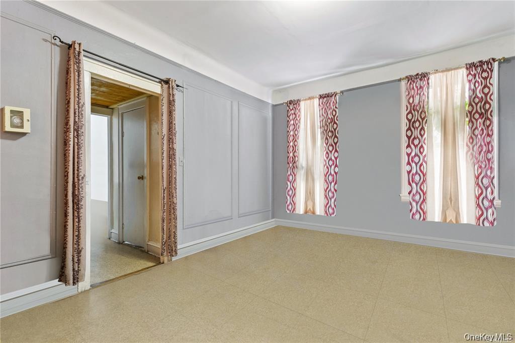 97-28 41st Avenue Queens, NY 11368 - Photo 23 of 29 an empty room with windows
