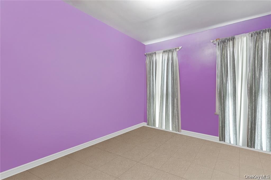 97-28 41st Avenue Queens, NY 11368 - Photo 24 of 29 a empty room with a window