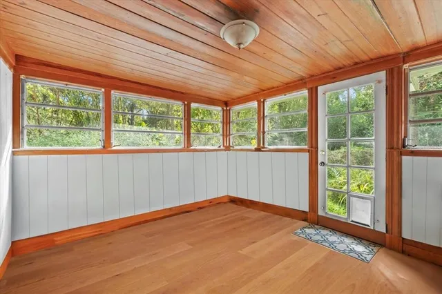 a view of a room with a large window