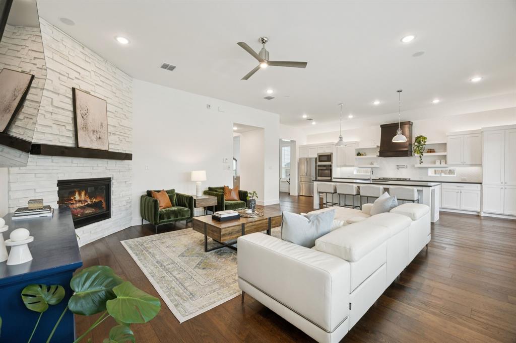 7024 Prairie Ridge Road Argyle, TX 76226 - Photo 12 of 40 Bright and Inviting Living Room Bathed in Beautiful Natural Light