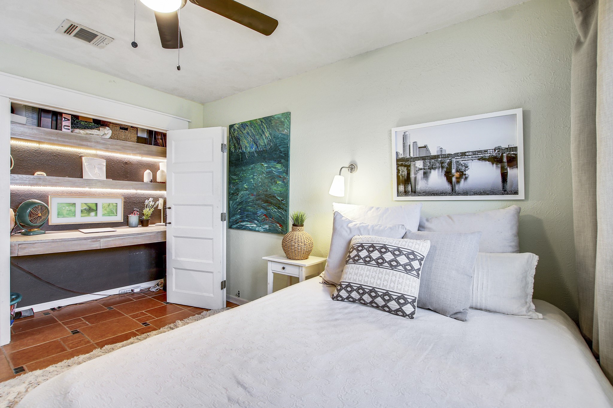 7741 Manassas Drive Austin, TX 78745 - Photo 24 of 39 Bedroom featuring built in study area and a ceiling fan
