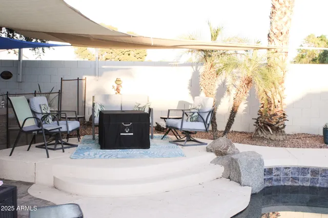 a view of a kitchen with a sink and microwave