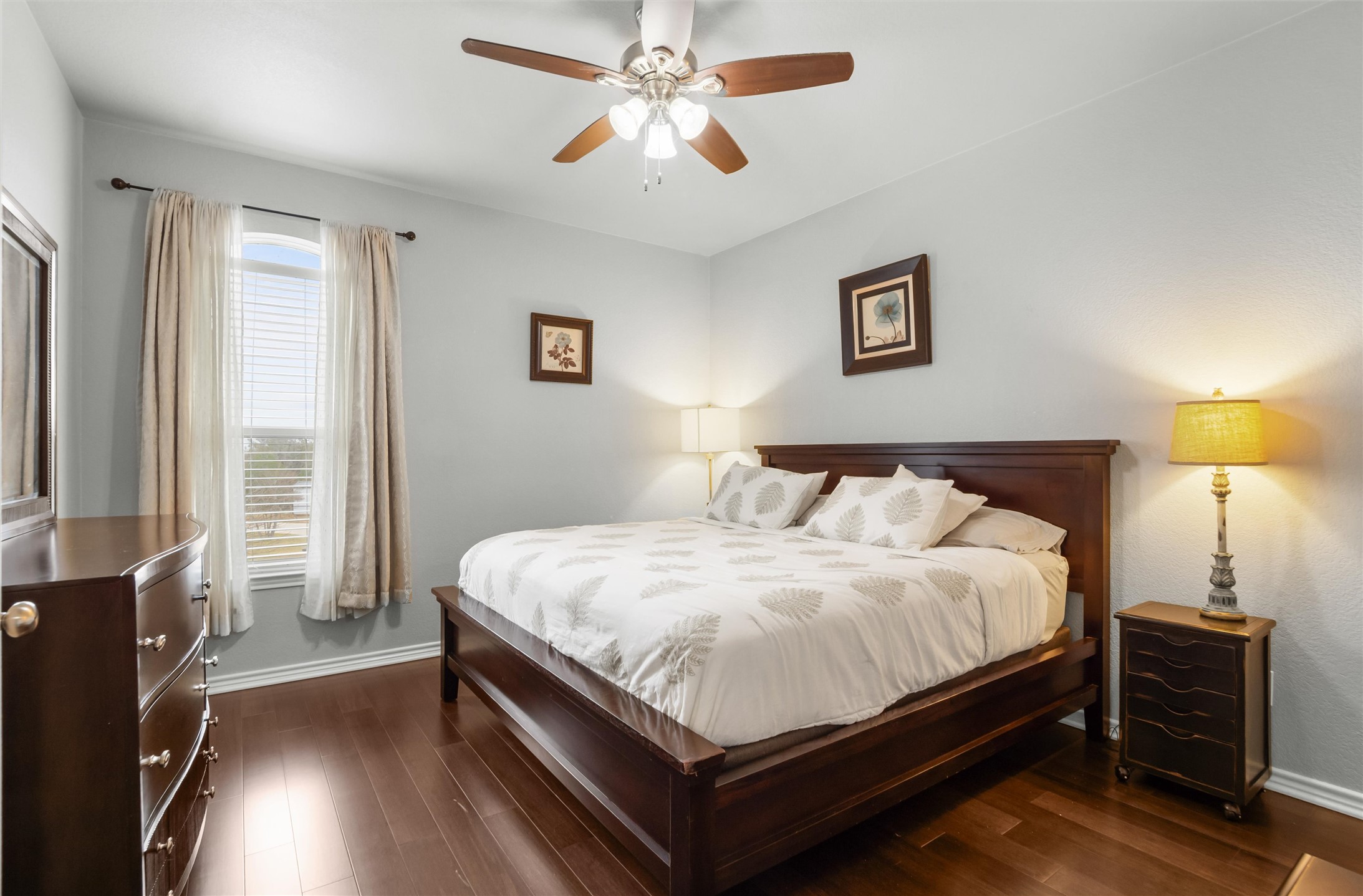 16017 Toby Court Temple, TX 76502 - Photo 20 of 33 Bedroom with a ceiling fan and dark wood-style floors