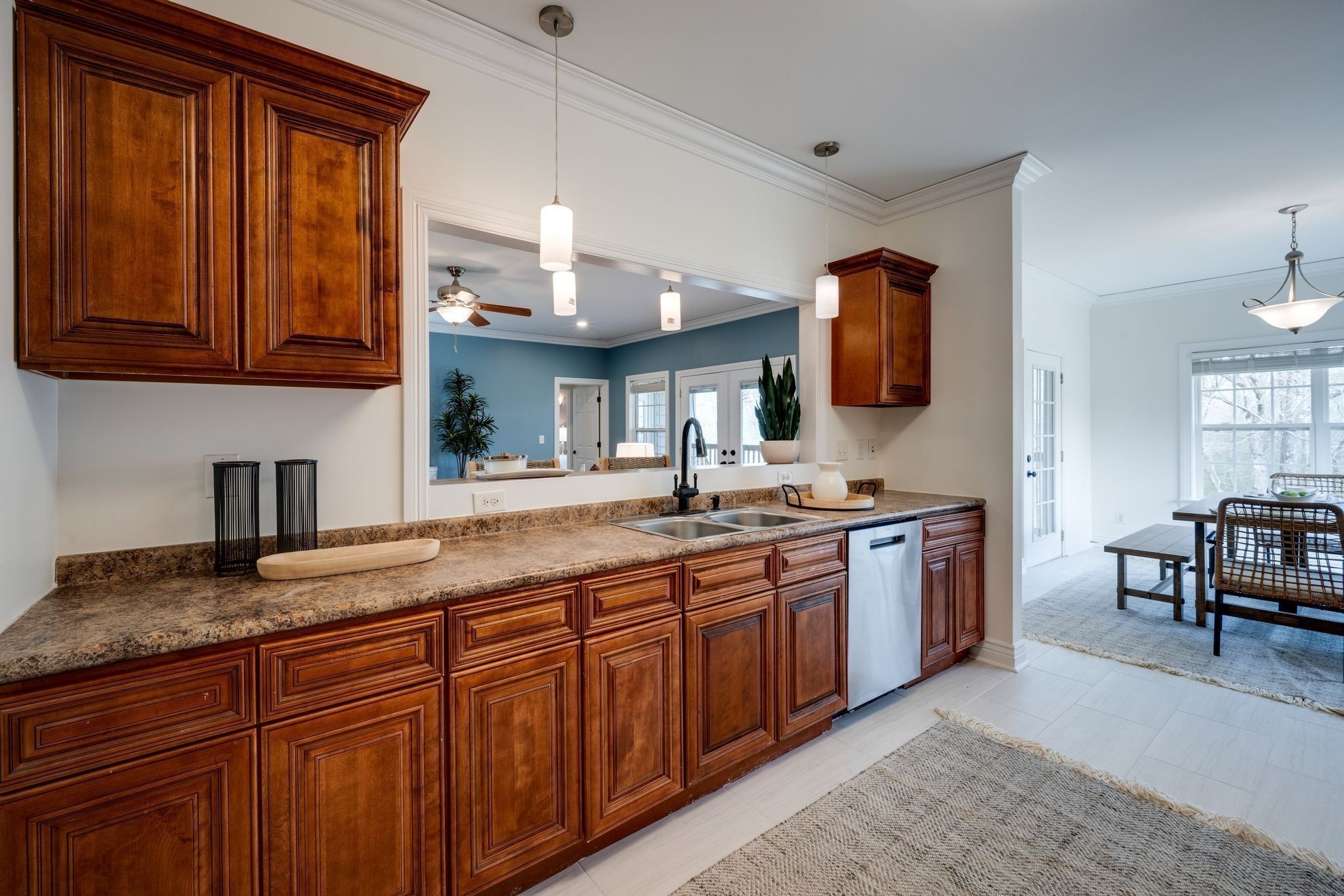 264 Fire Tower Road Dickson, TN 37055 - Photo 19 of 46 a spacious bathroom with a granite countertop sink and a mirror