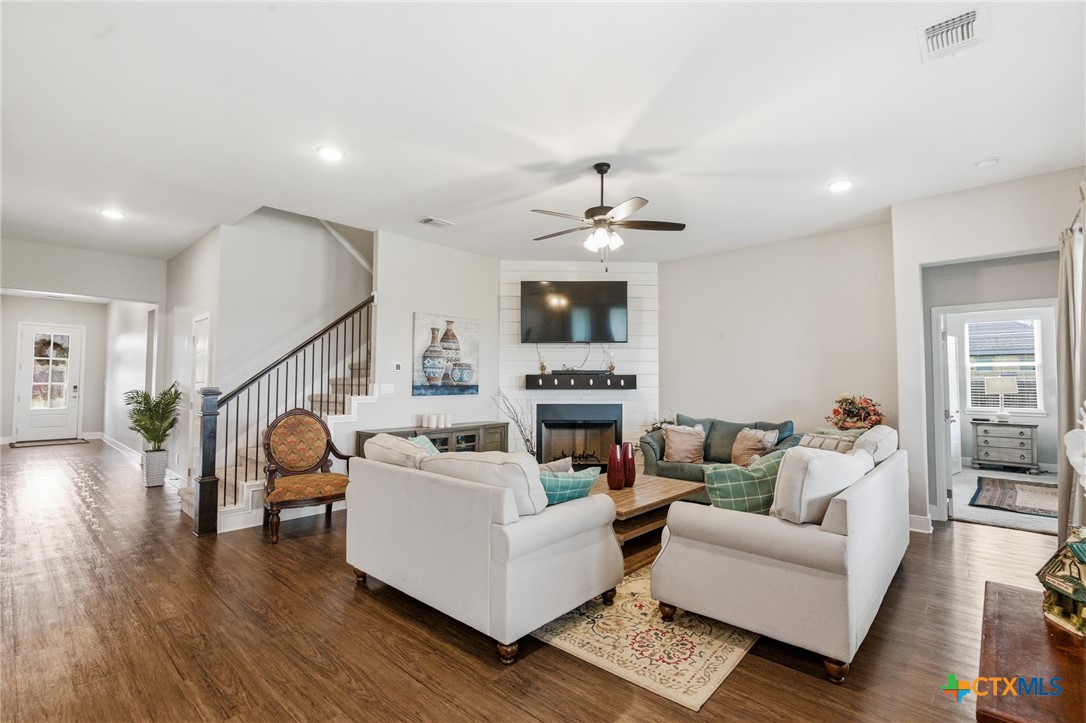 113 Terra Vista Ranch Road Victoria, TX 77904 - Photo 11 of 47 a living room with furniture and a fireplace