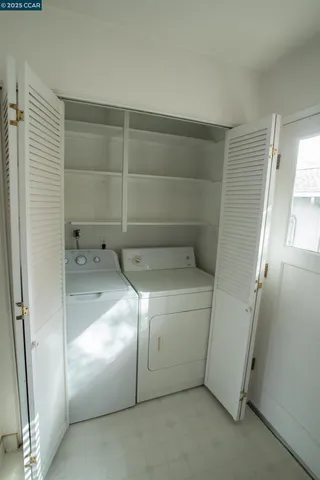 a utility room with a washer and dryer