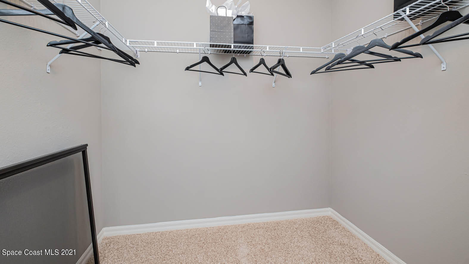 2054 Farmhouse Road Palm Bay, FL 32909 - Photo 15 of 31 a view of a rack on the wall