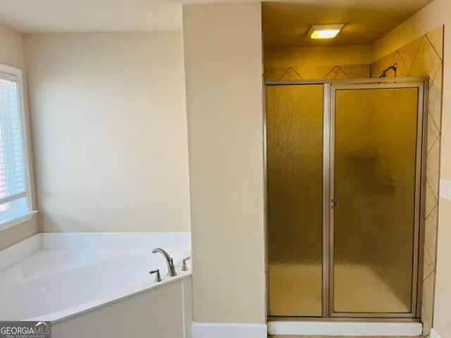 a view of balcony with wooden floor