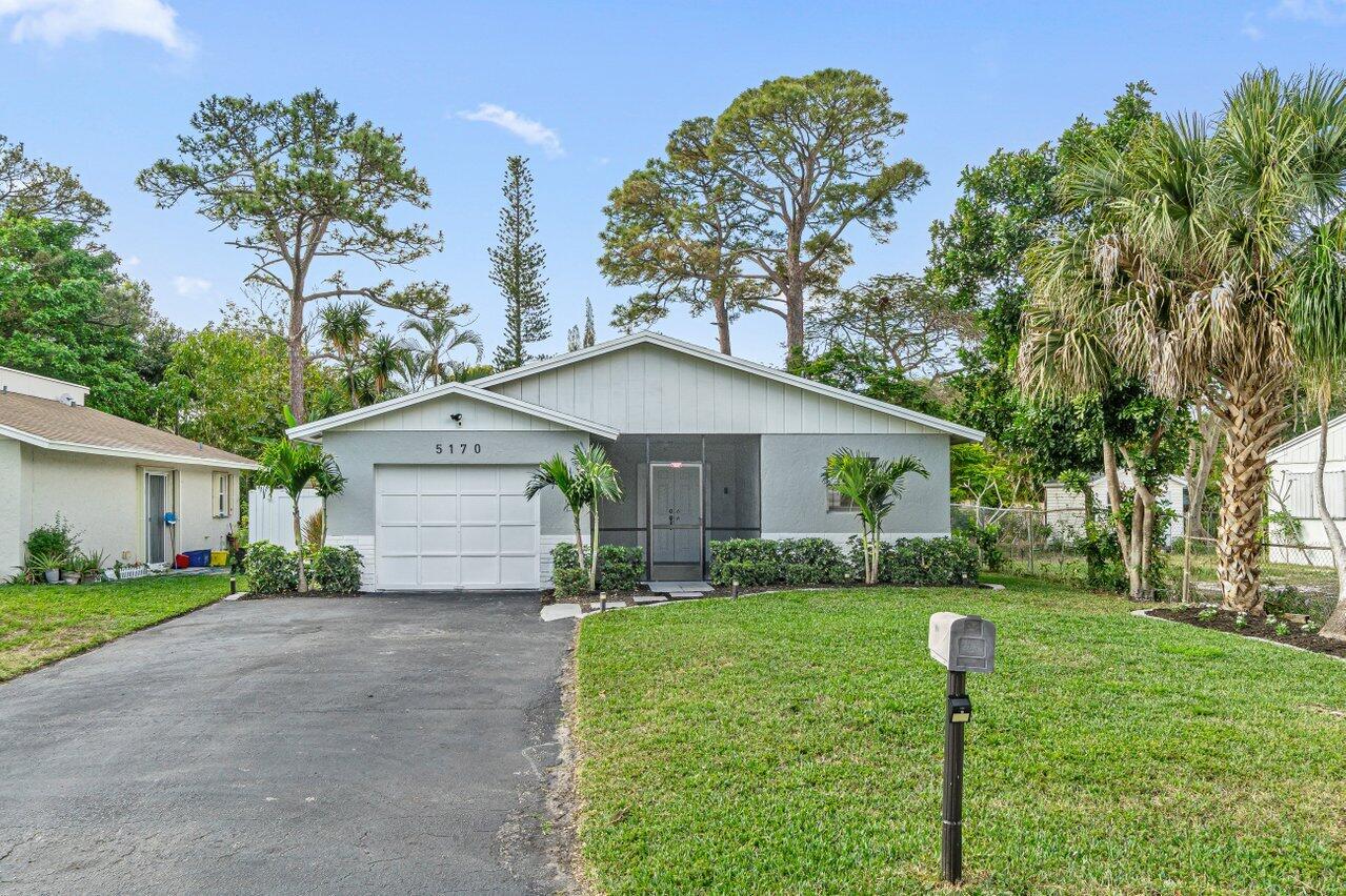 5170 Madison Road Delray Beach, FL 33484 - Photo 1 of 21 Exterior front