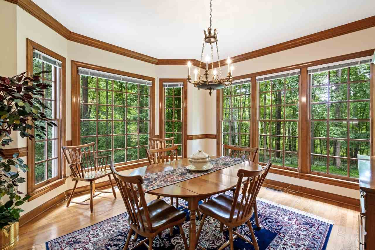 4125 Ridgebrook Bluffs Drive Raleigh, NC 27603 - Photo 9 of 30 Floor to Ceiling Windows Overlooking Yard and Trees