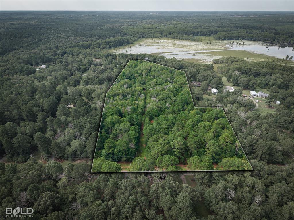 11015 Hereford Road Mooringsport, LA 71060 - Photo 2 of 18 Wooded acreage outlined by a white border