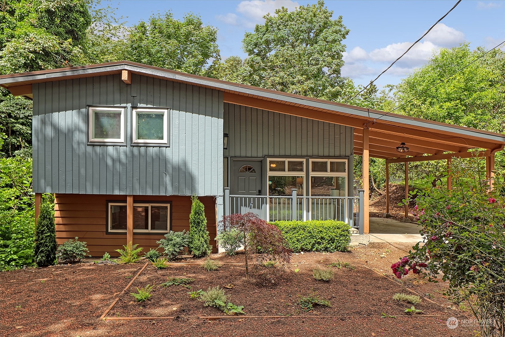 11629 53rd Avenue South Seattle, WA 98178 - Photo 1 of 26 a front view of a house with garden