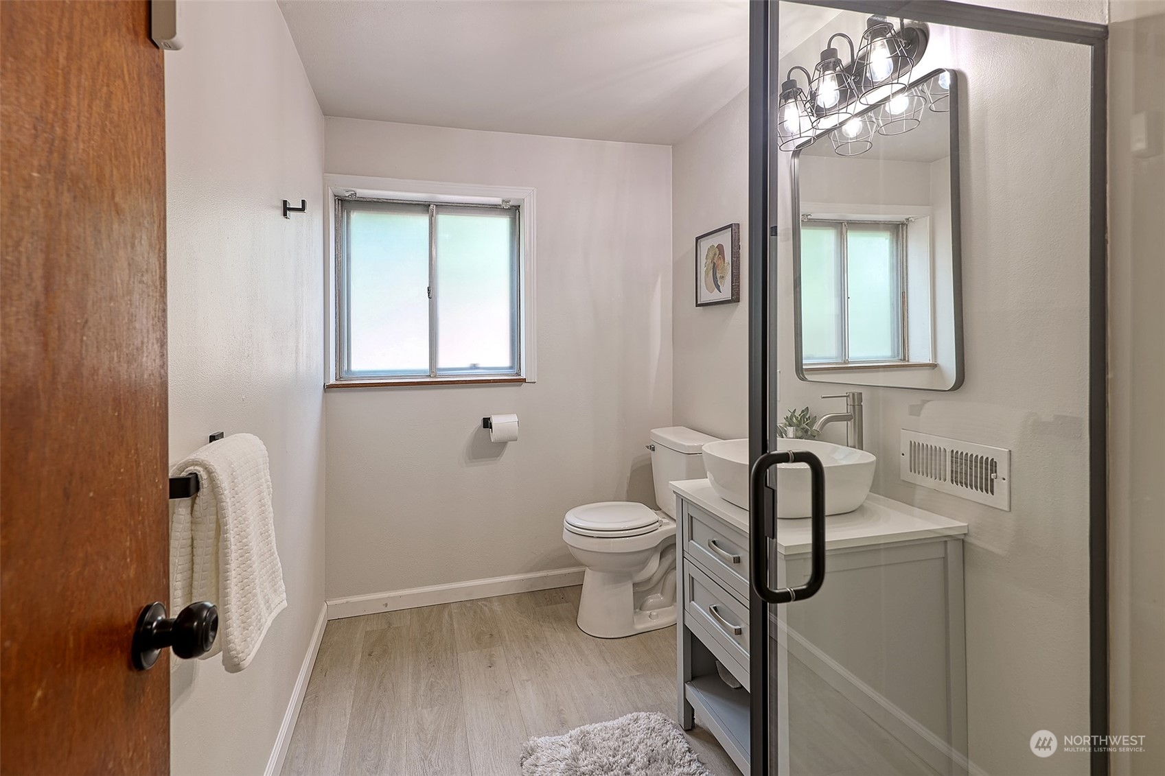 11629 53rd Avenue South Seattle, WA 98178 - Photo 17 of 26 a bathroom with a toilet sink and shower