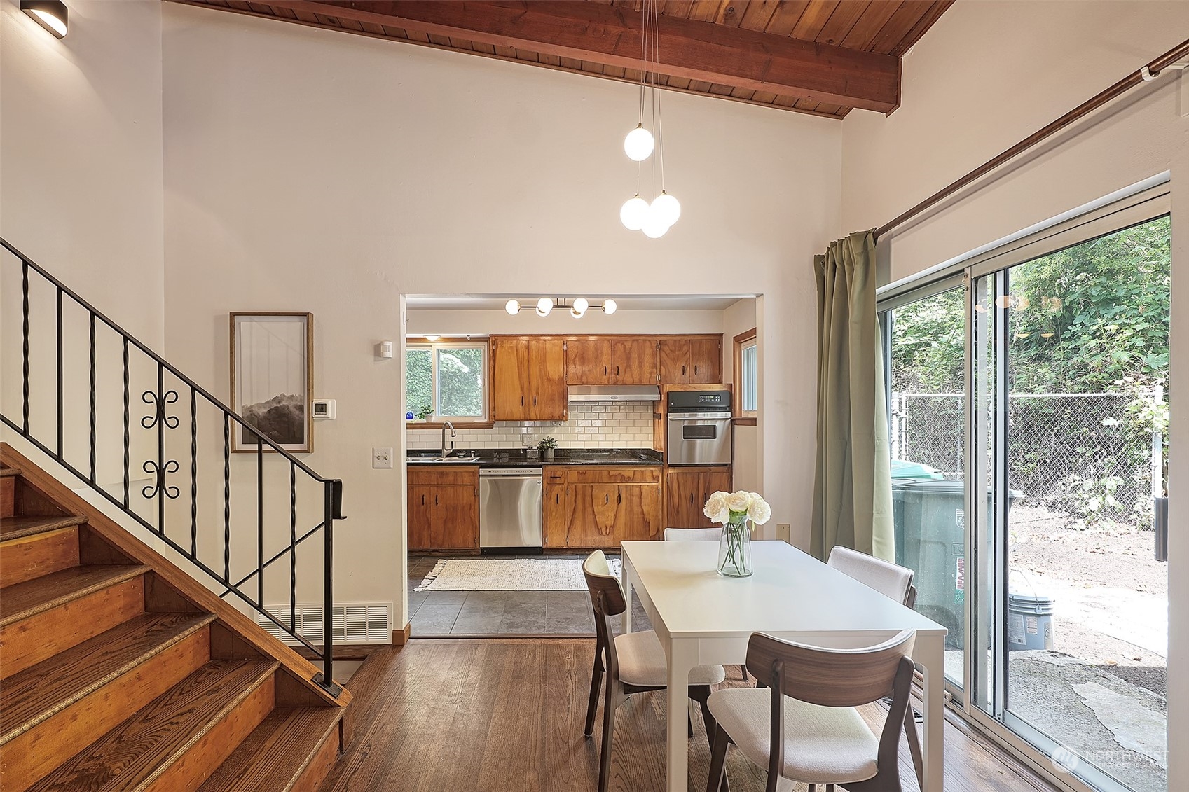 11629 53rd Avenue South Seattle, WA 98178 - Photo 6 of 26 a dinning table and chairs in a kitchen