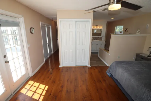 a view of livingroom with hardwood floor and a window