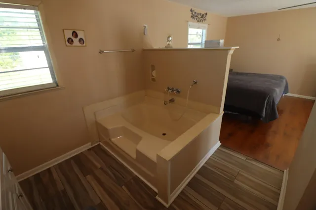 a view of a kitchen from the hallway