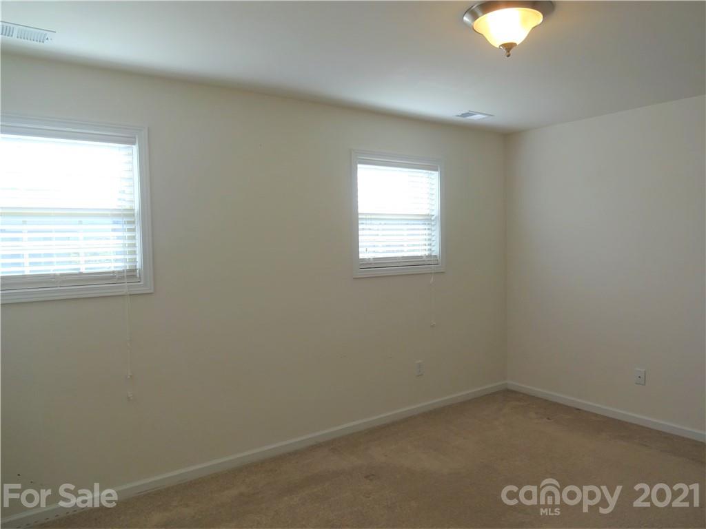 155 North River Road Fletcher, NC 28732 - Photo 22 of 25 an empty room with a window