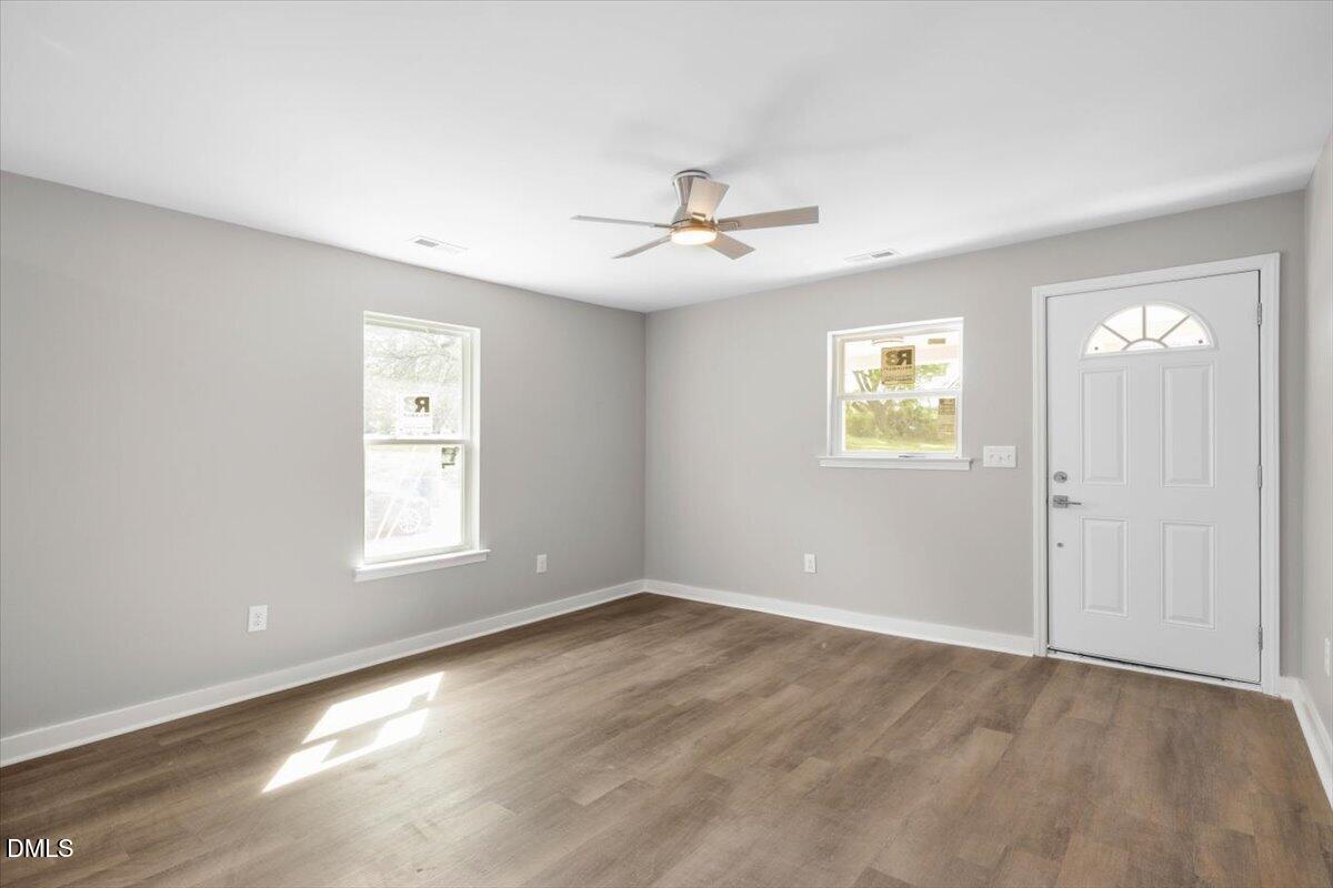 509 Sparella Street Durham, NC 27703 - Photo 7 of 30 a view of an empty room with a window