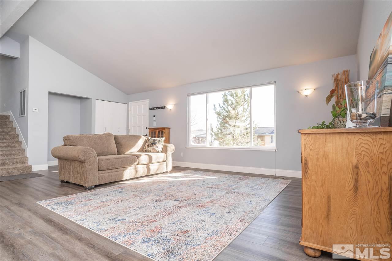 3675 Renee Way Reno, NV 89503 - Photo 12 of 40 a living room with furniture and a large window