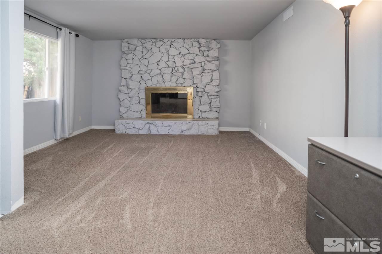 3675 Renee Way Reno, NV 89503 - Photo 18 of 40 a view of empty room with a fireplace