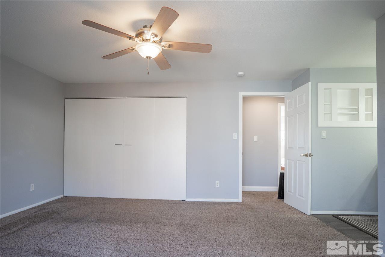 3675 Renee Way Reno, NV 89503 - Photo 20 of 40 a view of an empty room with a ceiling fan
