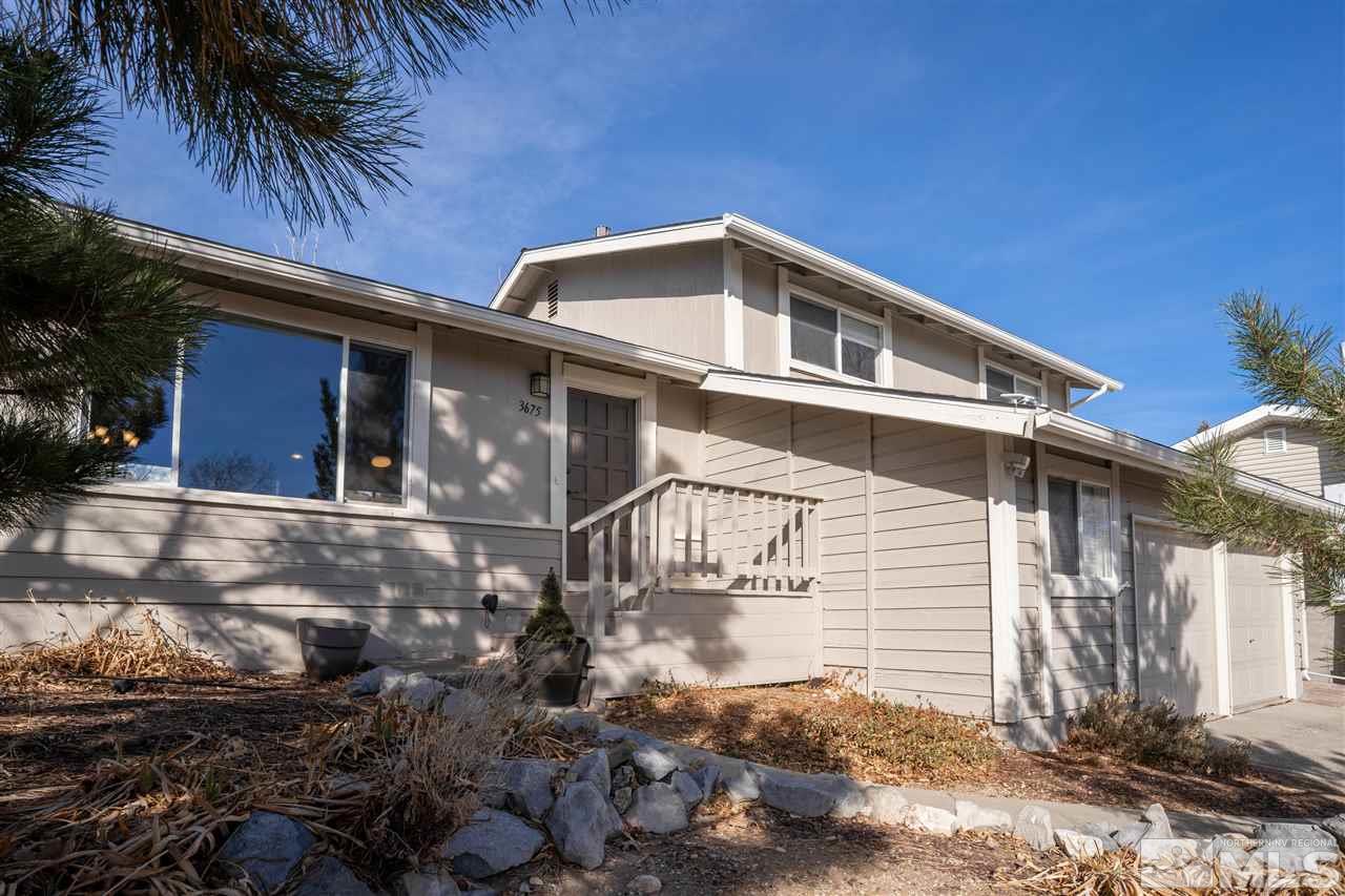 3675 Renee Way Reno, NV 89503 - Photo 2 of 40 a front view of a house with a yard