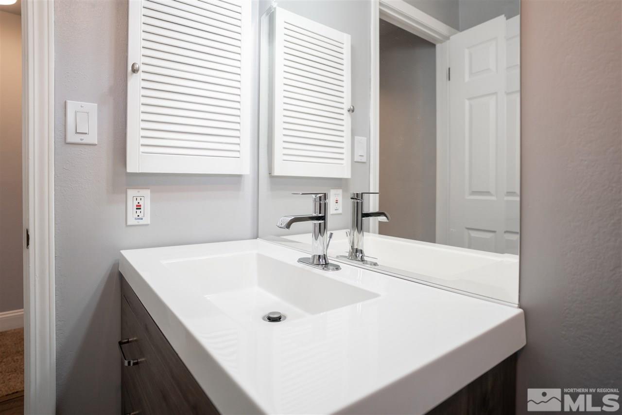 3675 Renee Way Reno, NV 89503 - Photo 29 of 40 a bathroom with a sink and a window