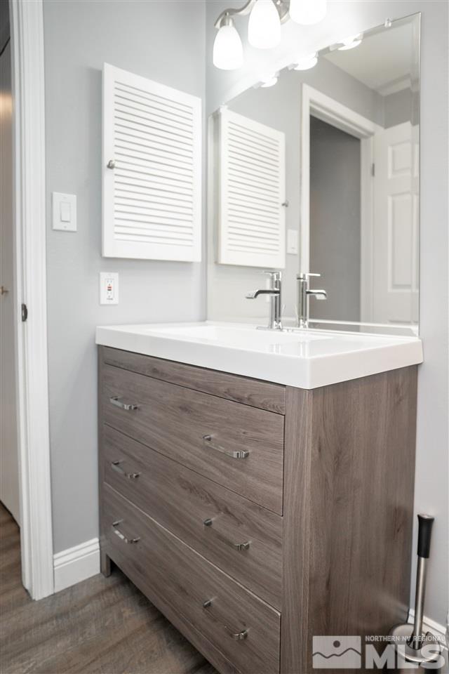 3675 Renee Way Reno, NV 89503 - Photo 32 of 40 a bathroom with a sink and a mirror