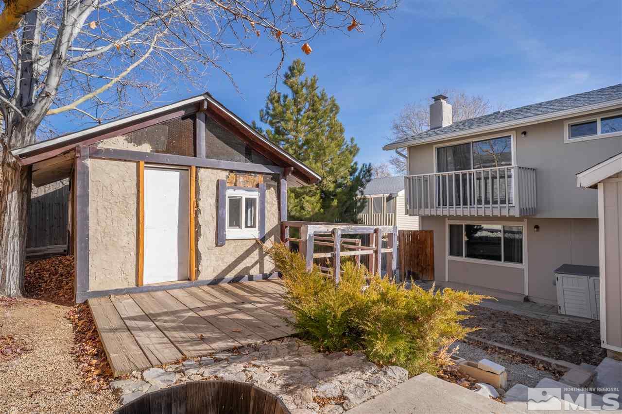 3675 Renee Way Reno, NV 89503 - Photo 35 of 40 a front view of a house with a yard
